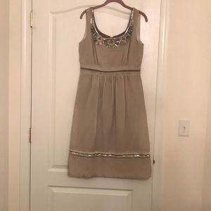 Tan formal dress with beaded detailing
